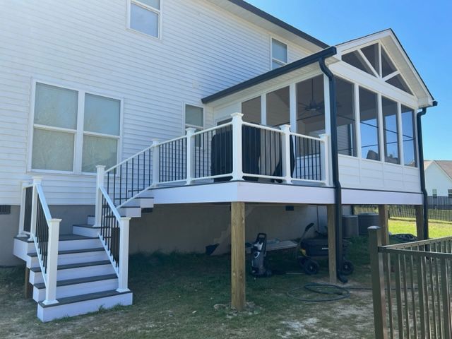elevated deck and a screened patio