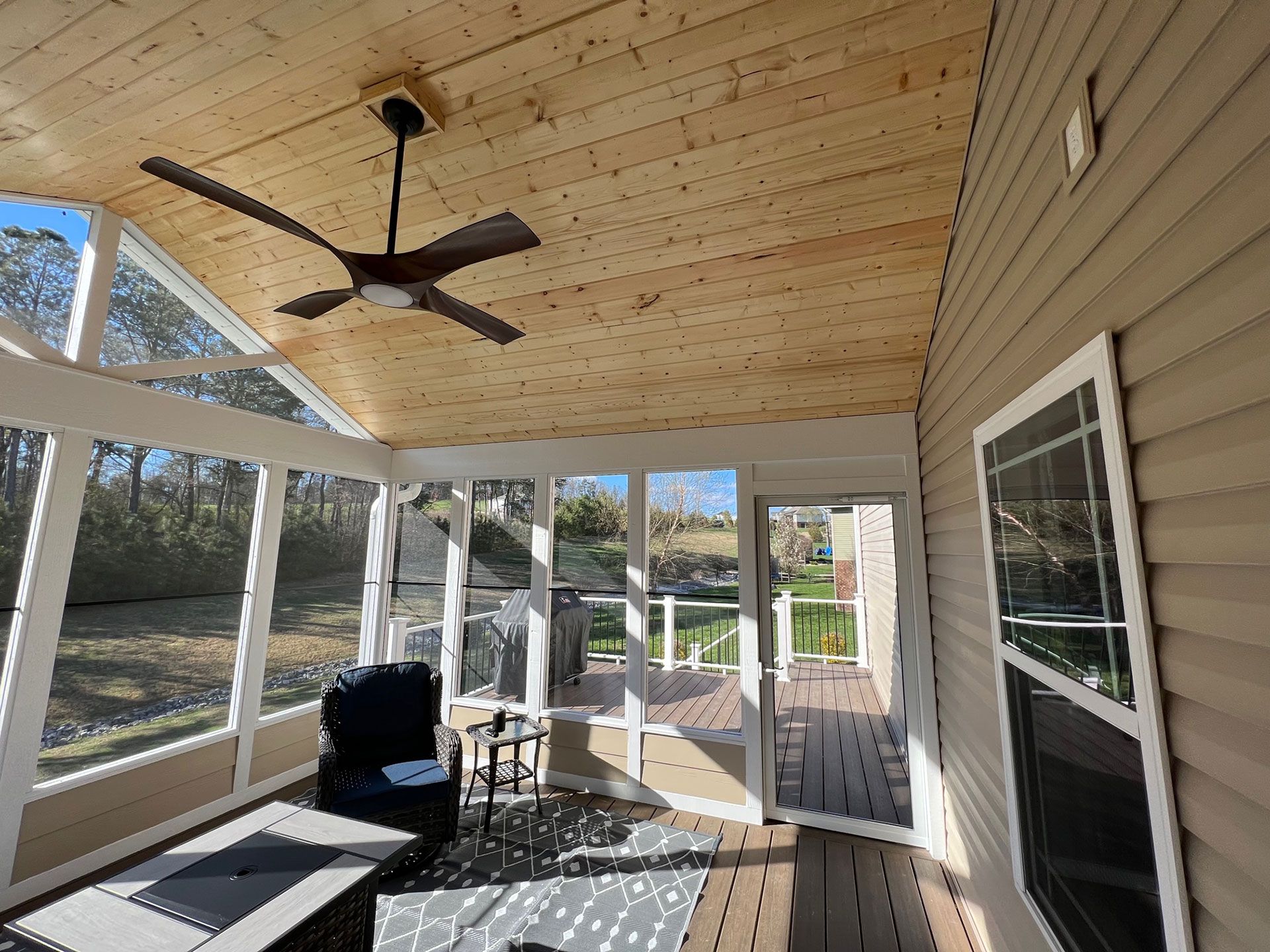 screened patio with ceiling fan