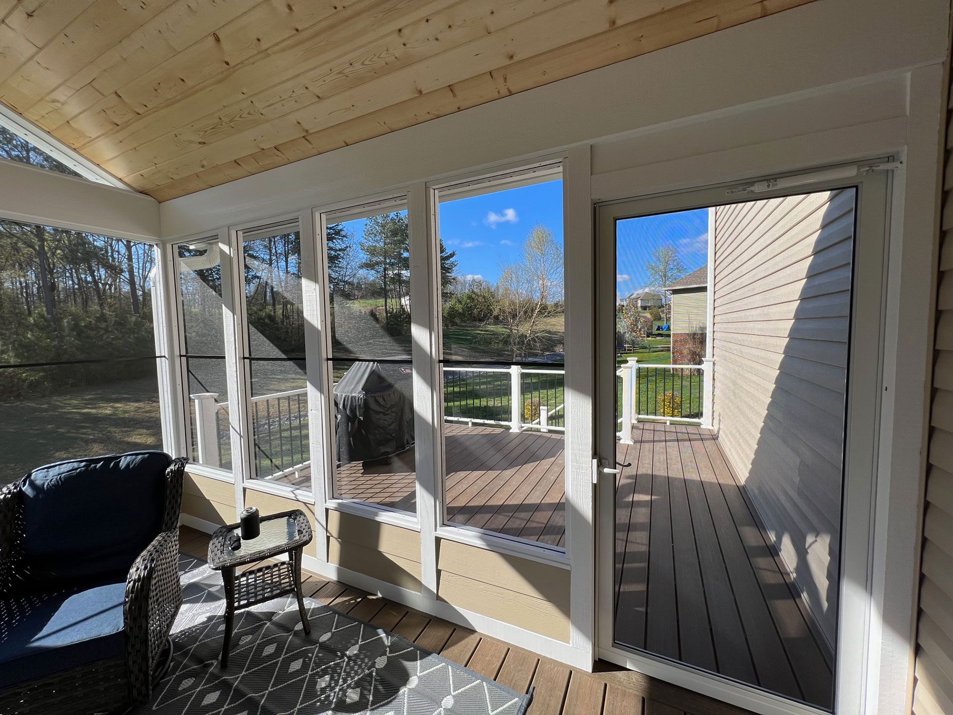 screened patio with deck
