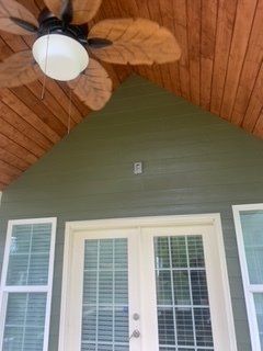 A ceiling fan is hanging from the ceiling of a house