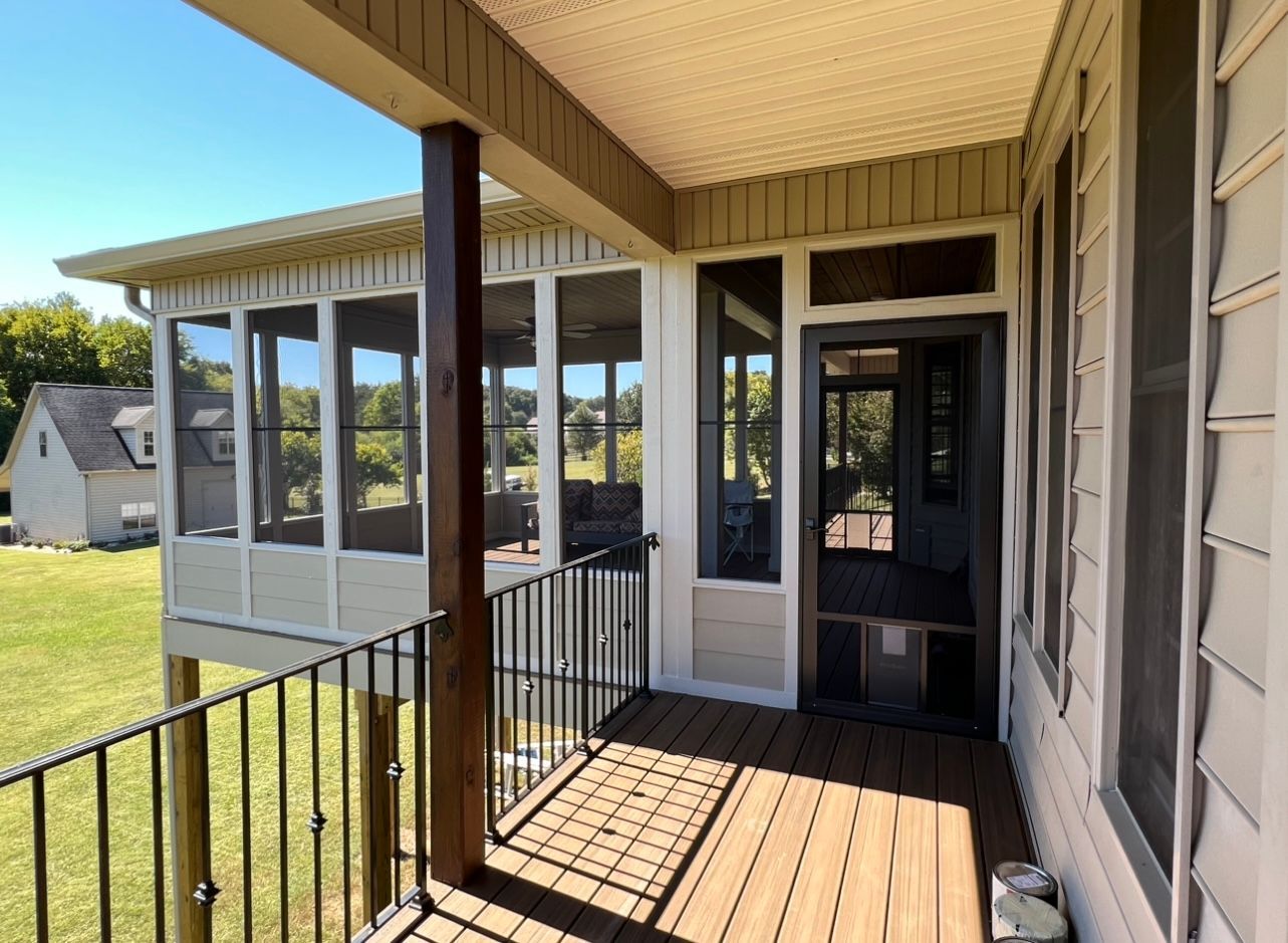 sun room exterior with railing