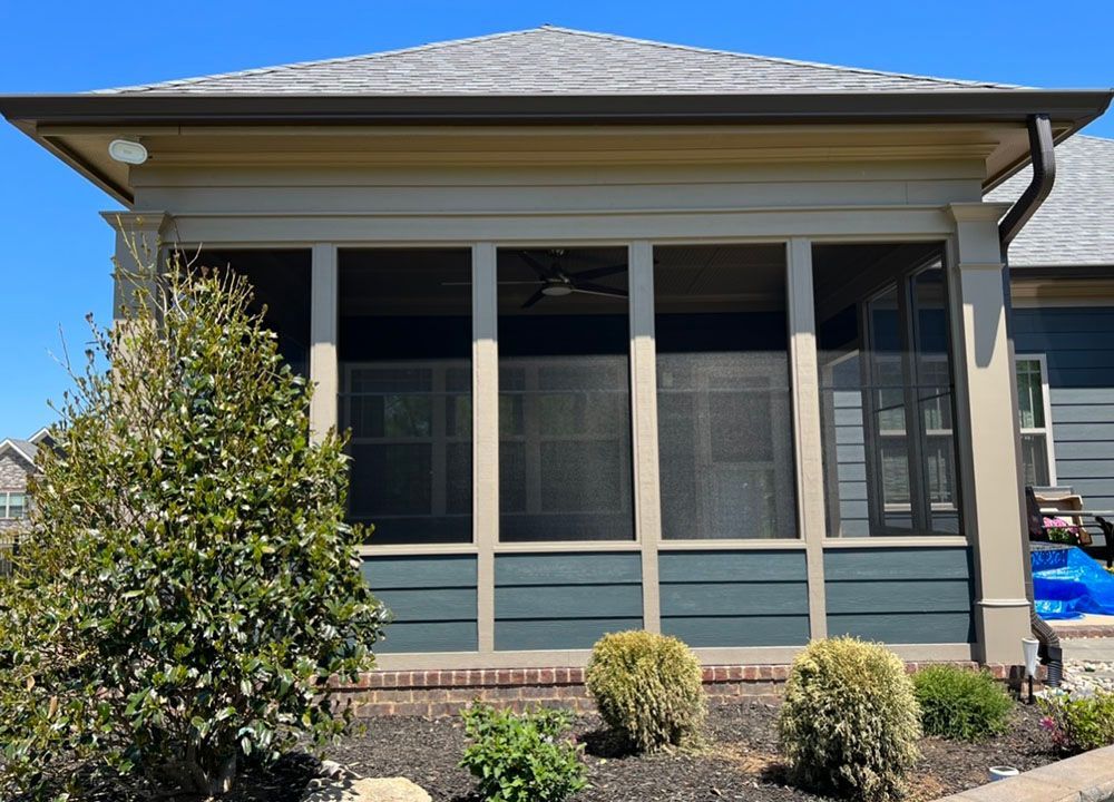 sun room exterior with landscape
