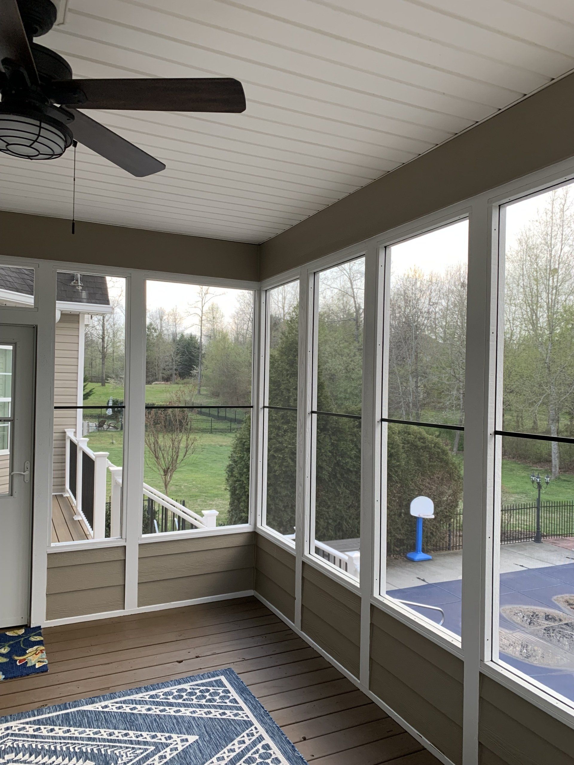 screened room with mini basketball court outside