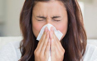 Woman with allergic rhinitis