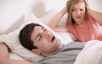 Man with snoring and breathing issues