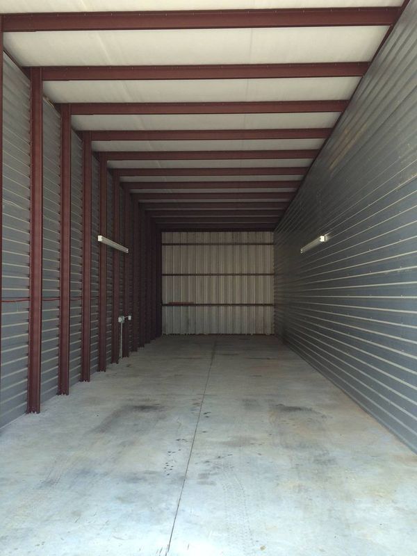 A large empty building with a concrete floor