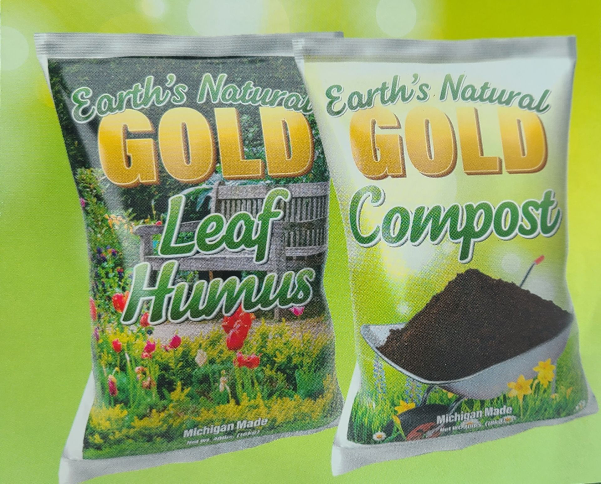 Two bags of Earth’s Natural Gold garden products, Leaf Humus and Compost, on a green background