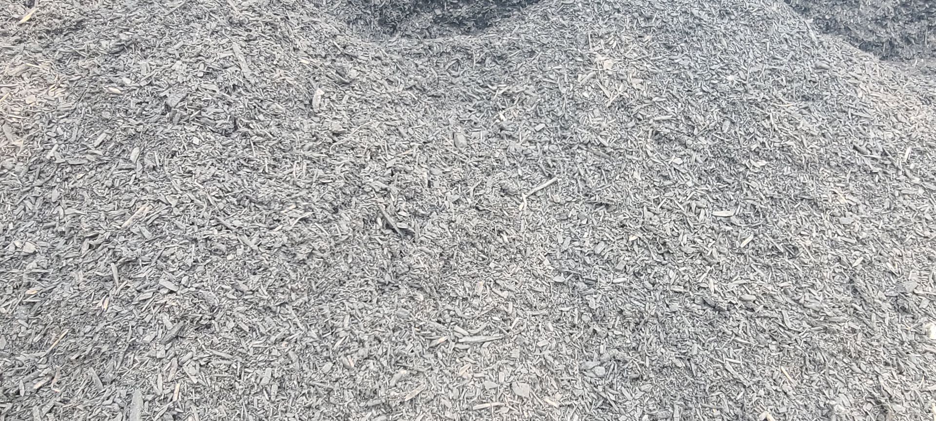 Close-up of gray gravel and small stones covering the ground