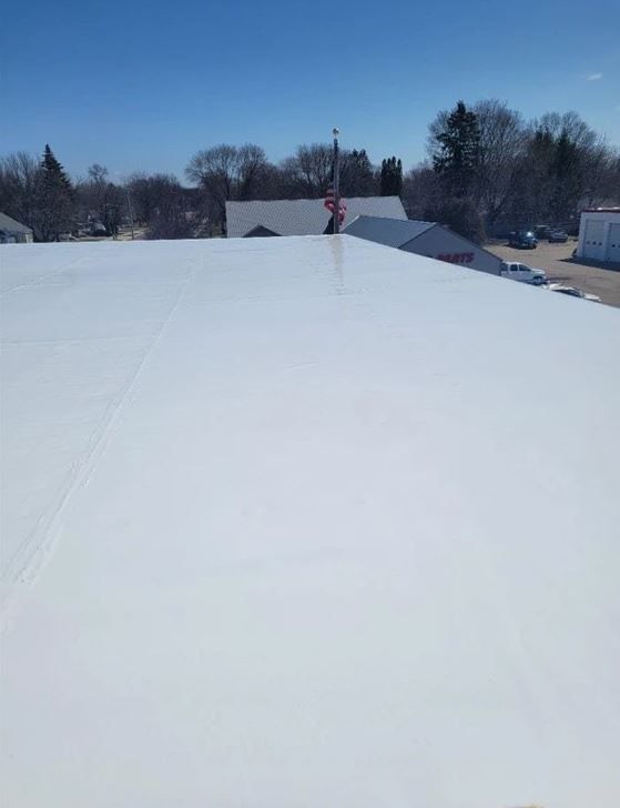 Single-ply roofing system installation