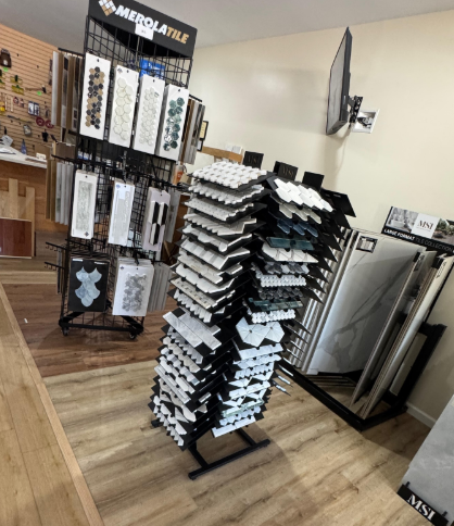 Retail display racks with assorted phone accessories in a store aisle
