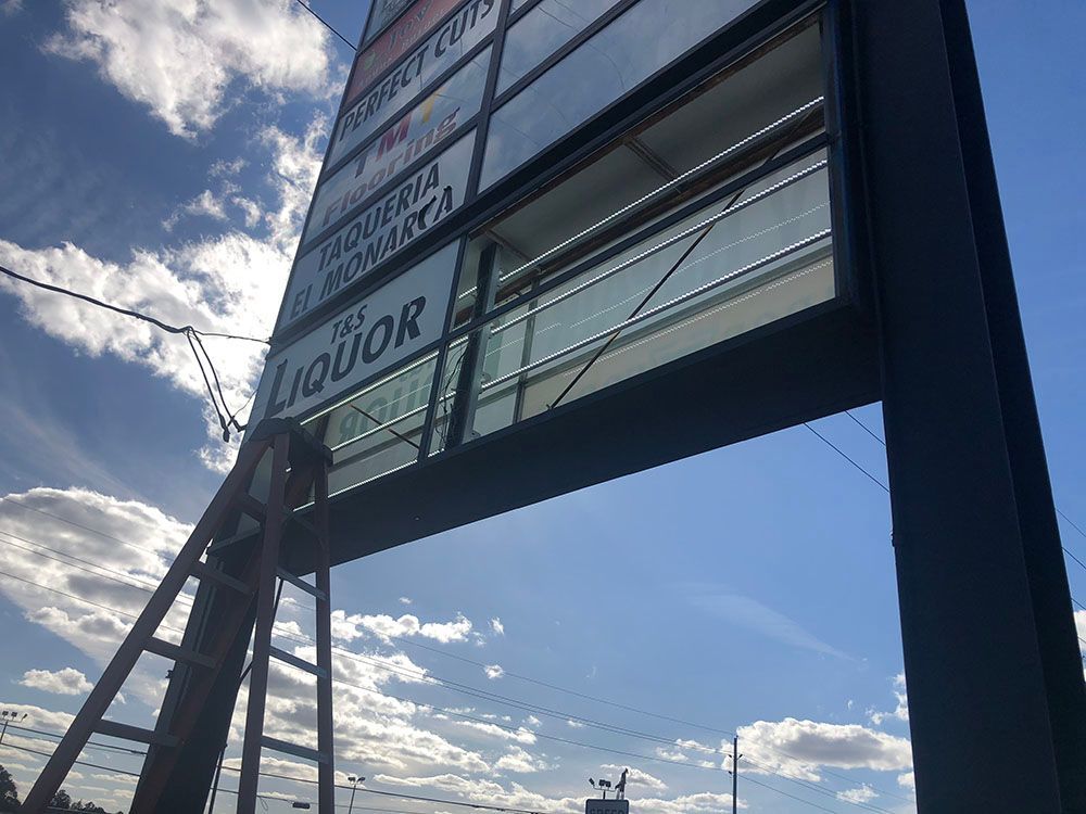 Signage installation on a large billboard