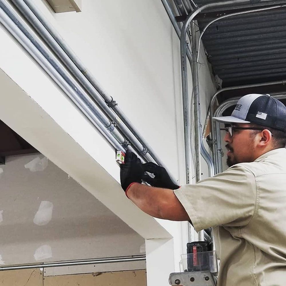 A man working on electrical pipes