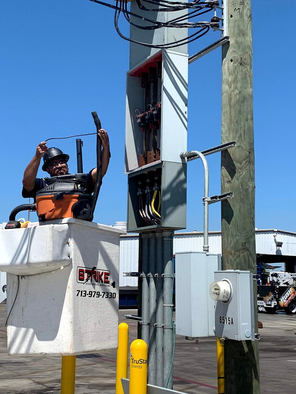 A man installing an electrical box