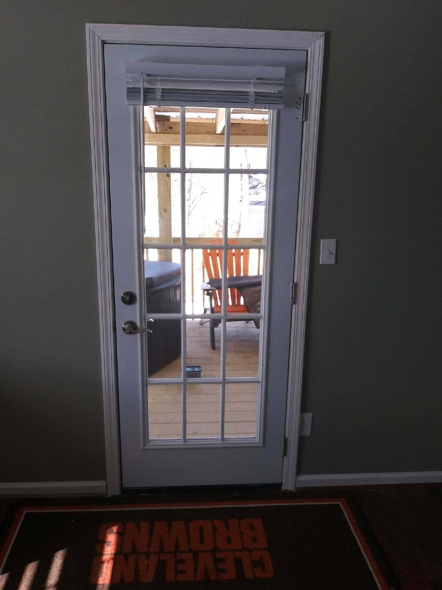 A door with a rug that says cleveland brown on it