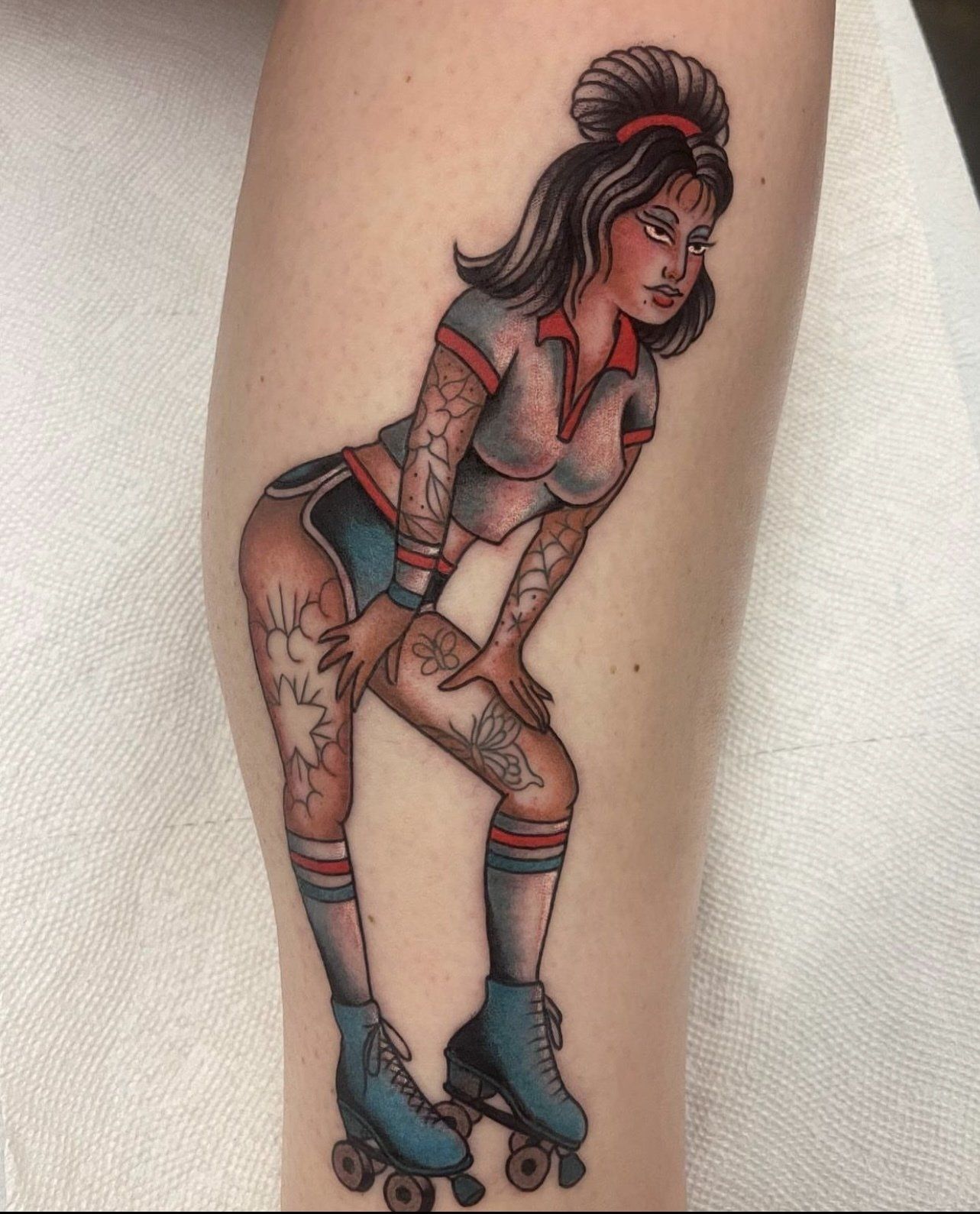 Tattoo woman on roller skates