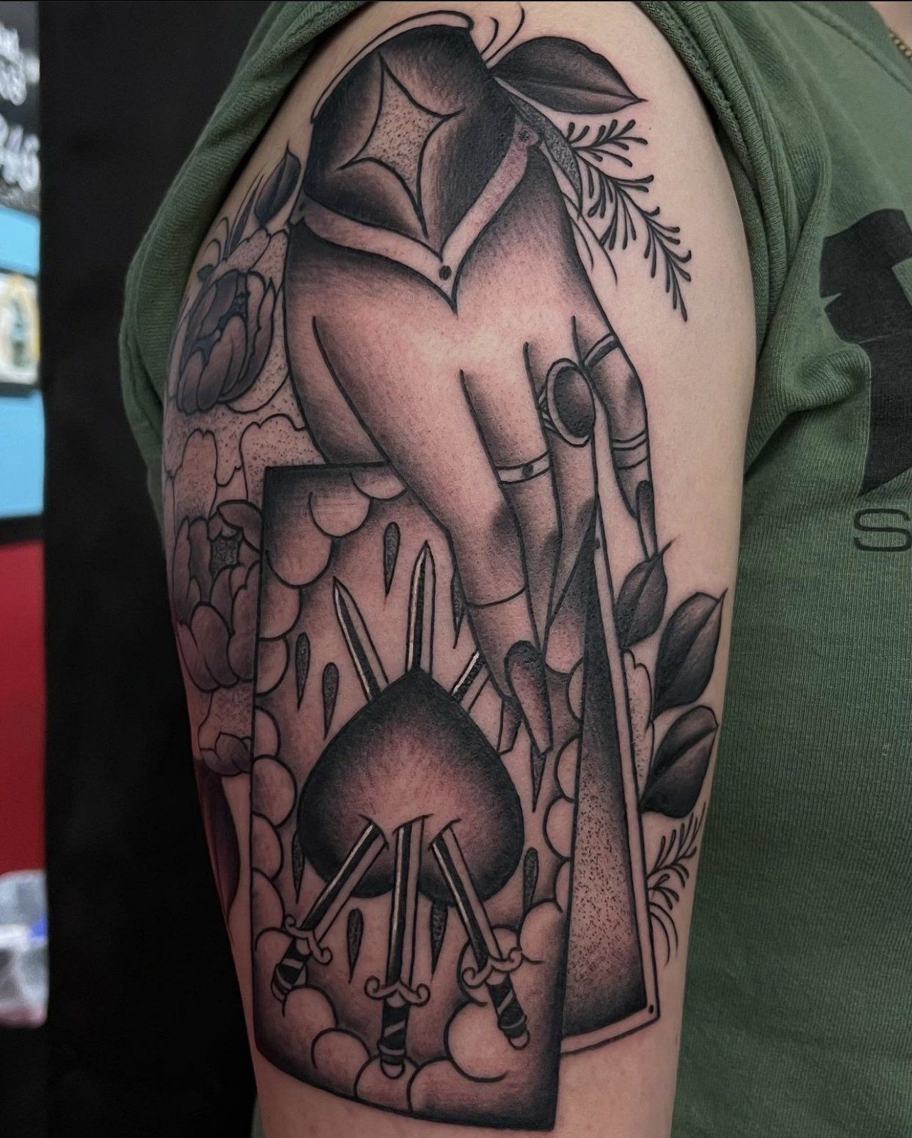 Tattoo hand with tarrot card