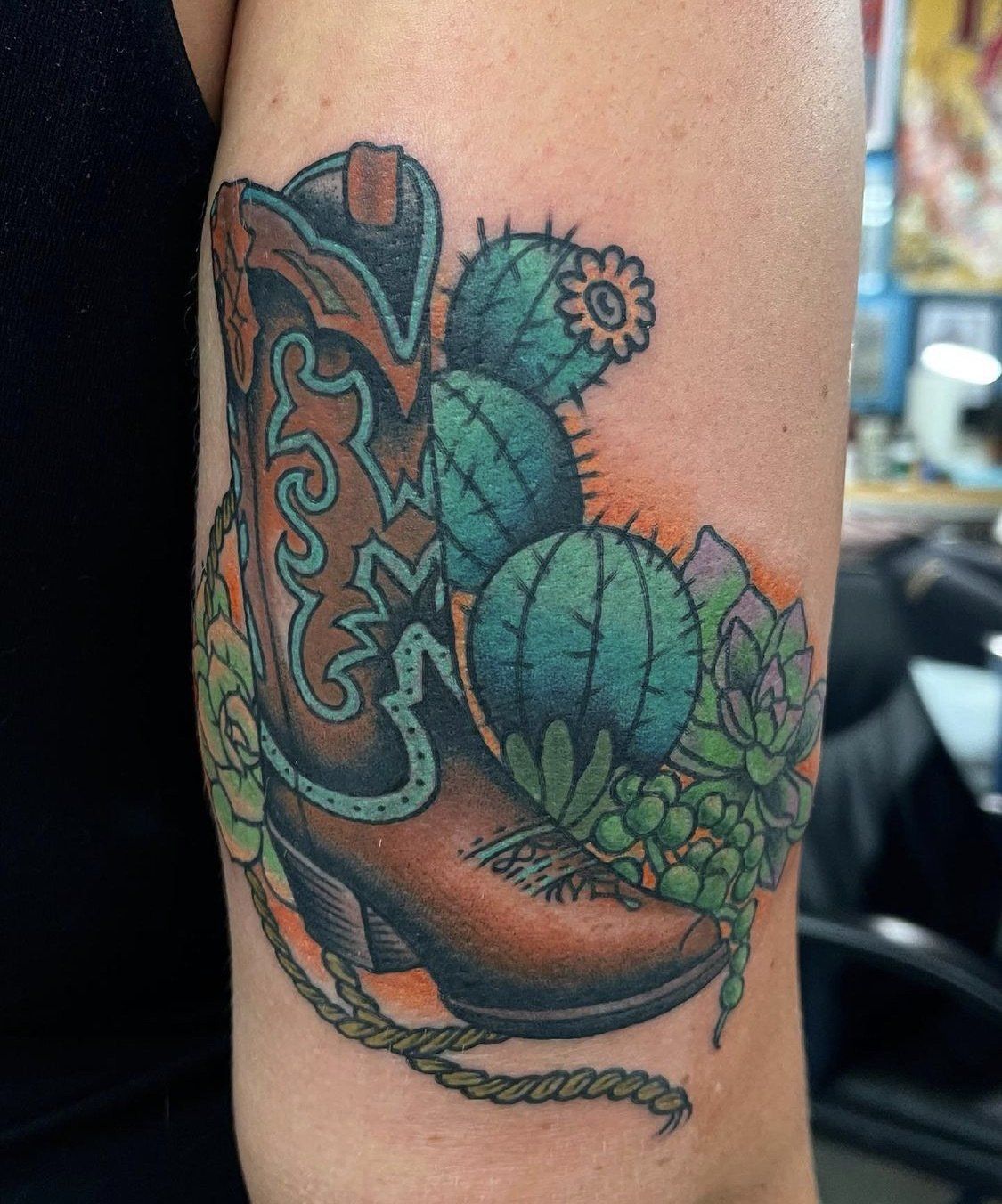 Tattoo cactus and cowboy boots