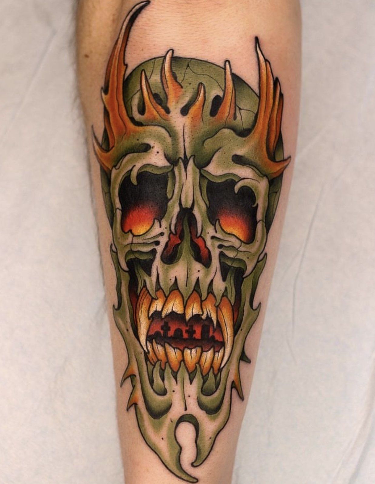 Tattoo arm skull face
