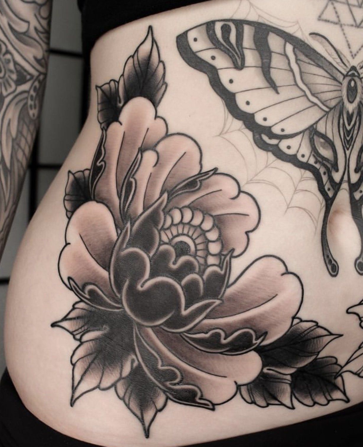 Tattoo butterfly and flower