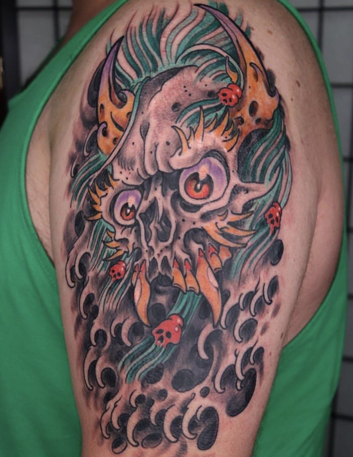 Tattoo on arm skull with horns