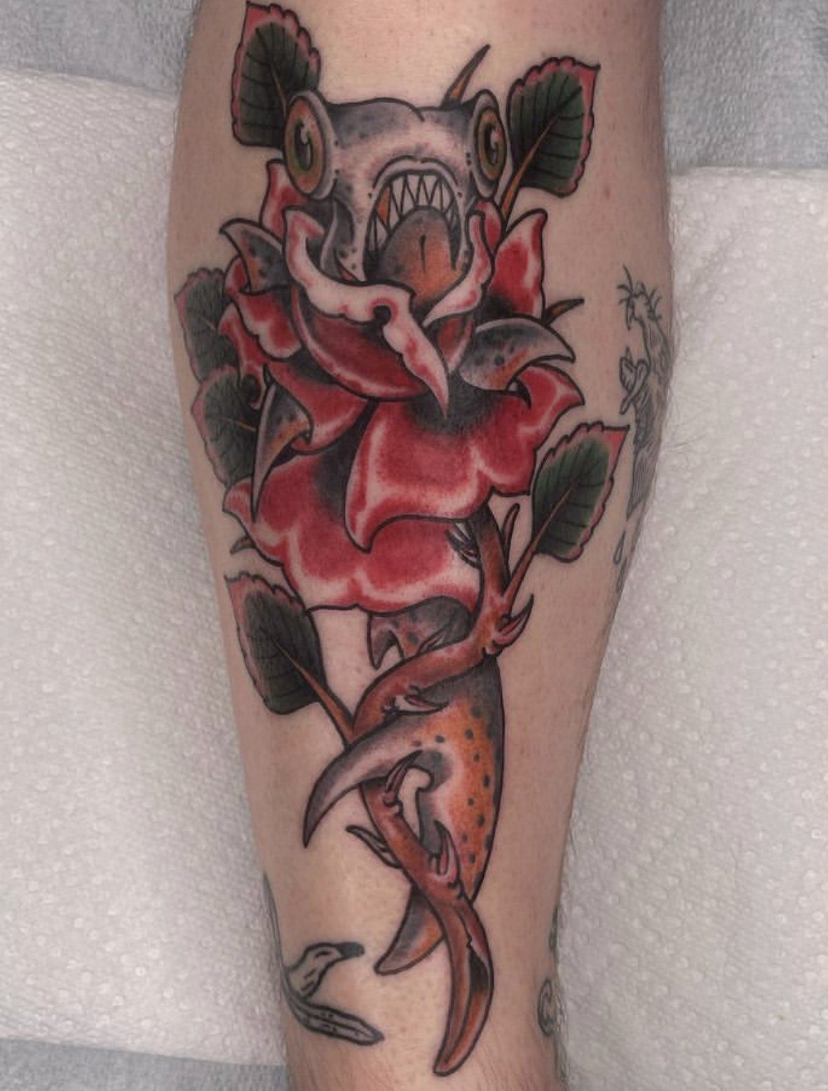 Tattoo fish on flowers