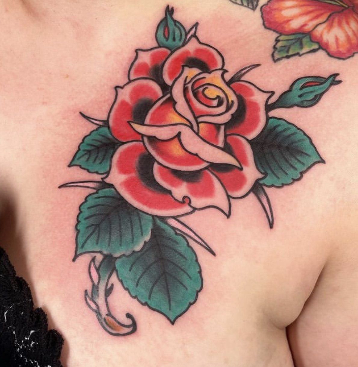 Tattoo open rose with thorns