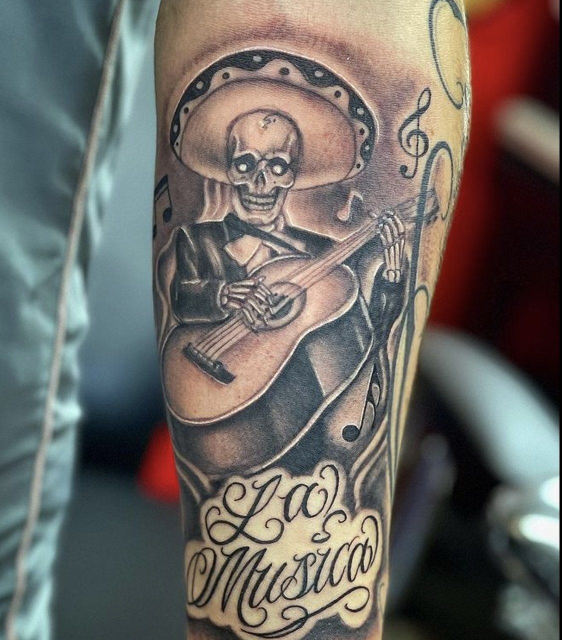 Tattoo la musica skeleton playing guitar