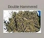 Pile of double hammered green tea leaves.