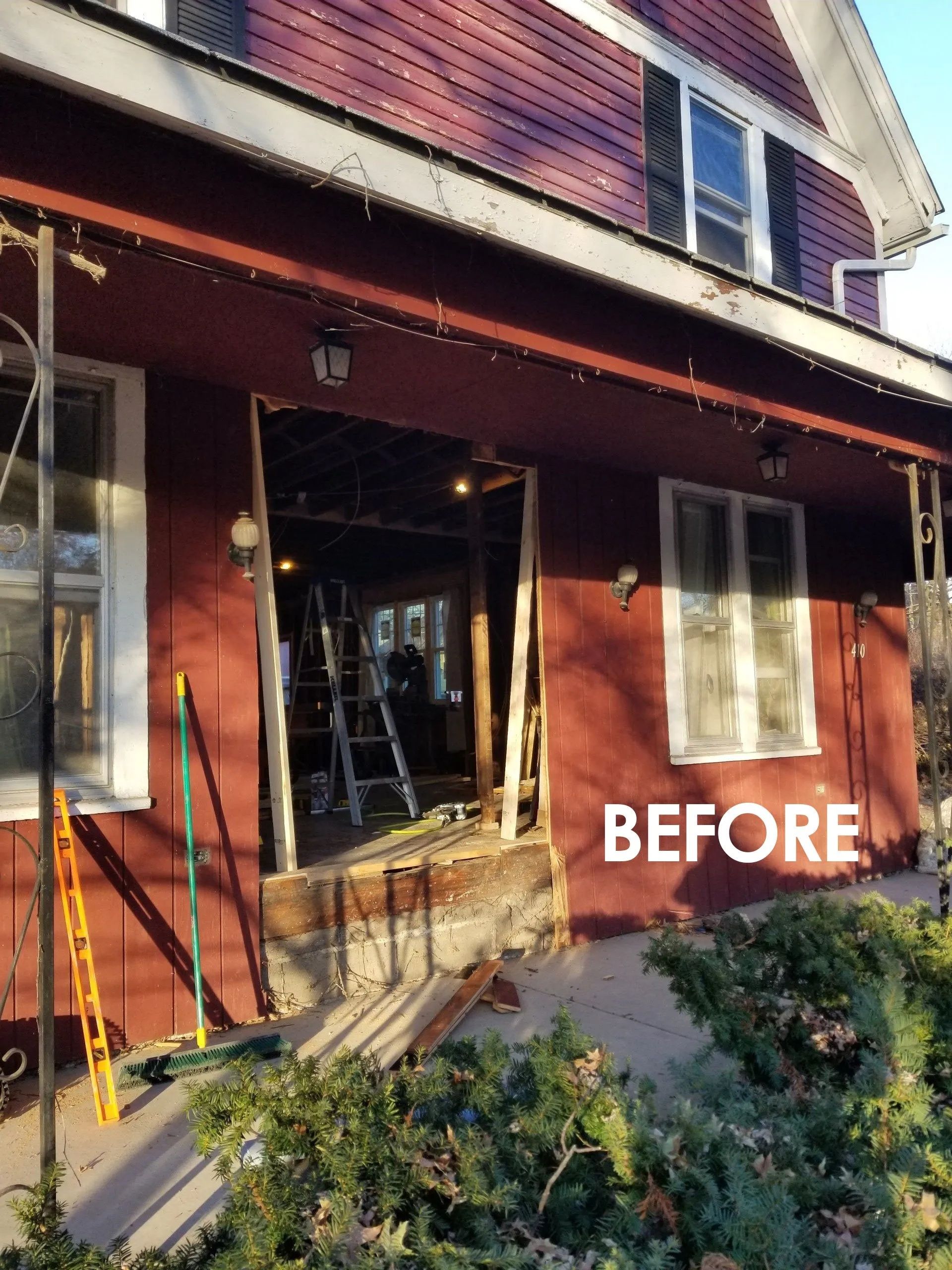 Red house exterior with open doorway and window, ladders outside, labeled “BEFORE”