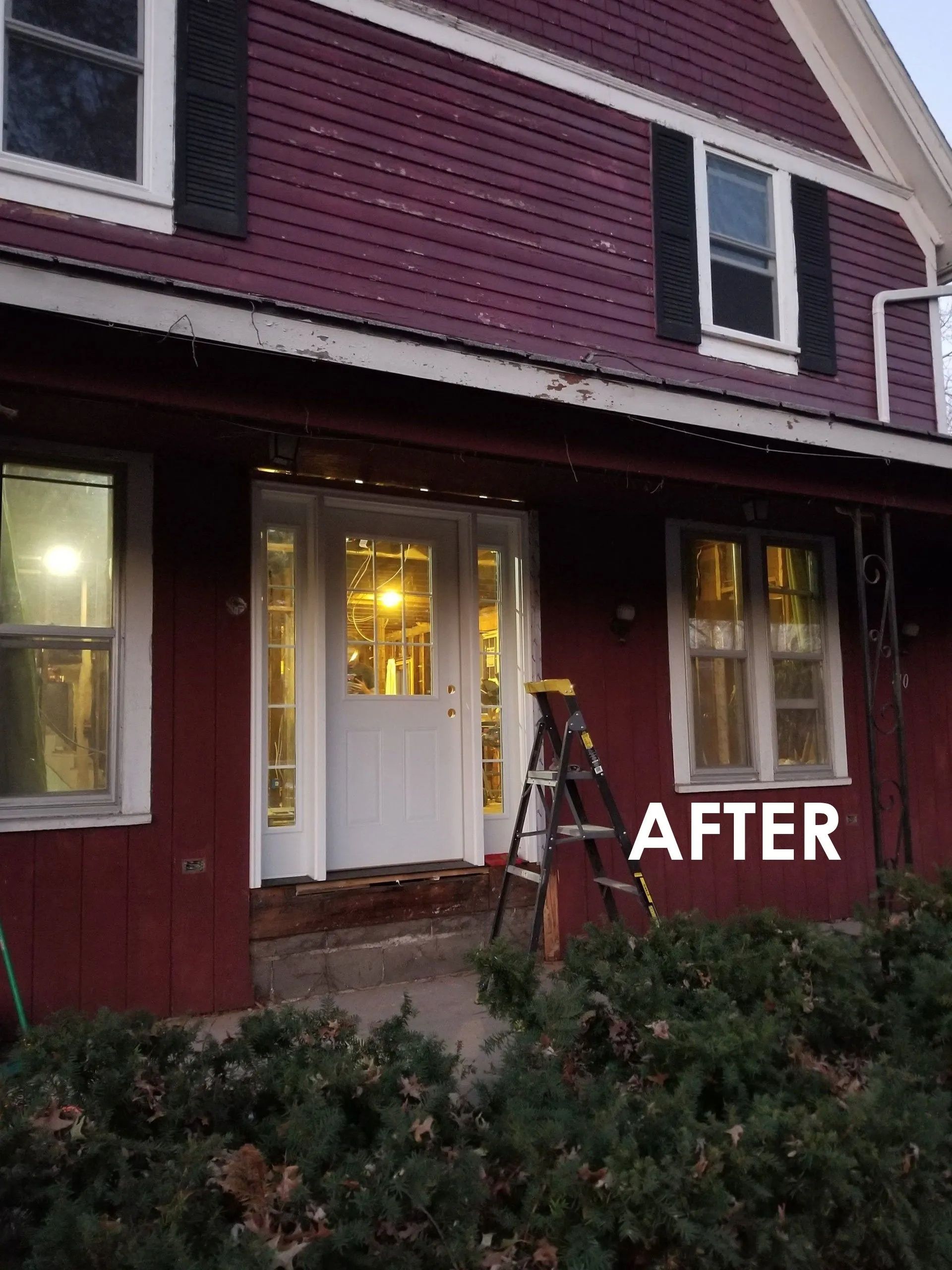 Front porch of a burgundy house at dusk, with lit windows and a white door labeled “AFTER.”