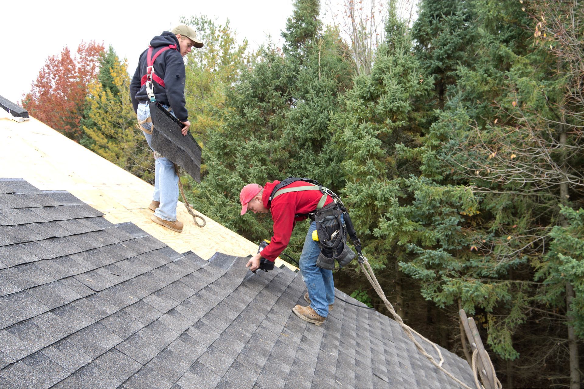Quality Roofing Contractors replacing a roof located in Eugene Oregon
