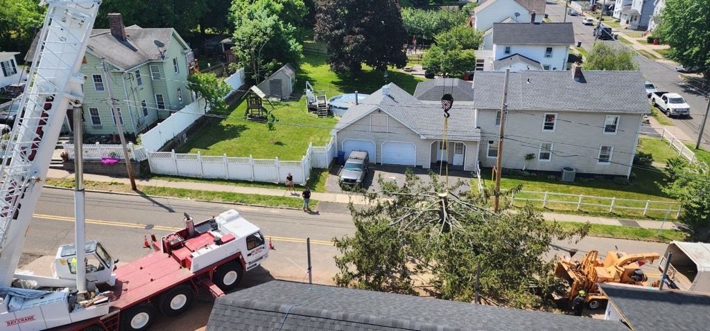 An aerial view of a fire truck on top of a roof