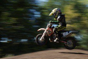 man riding KTM 65