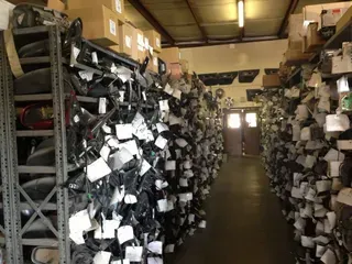 A warehouse filled with lots of parts and boxes