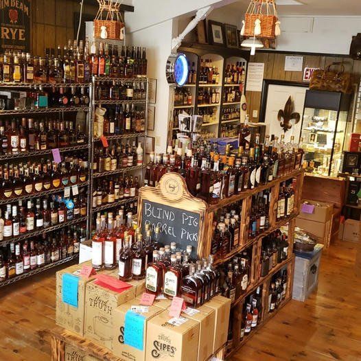A liquor store filled with lots of bottles of liquor