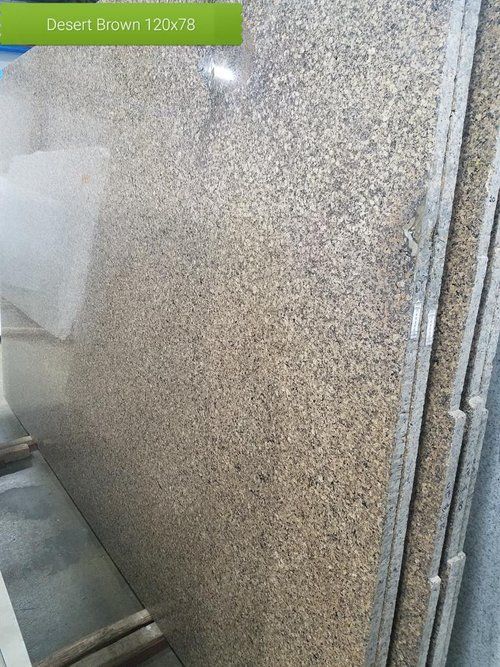 A large piece of granite is sitting on a shelf.