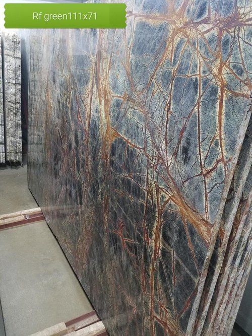 A stack of marble slabs sitting on top of each other in a room.