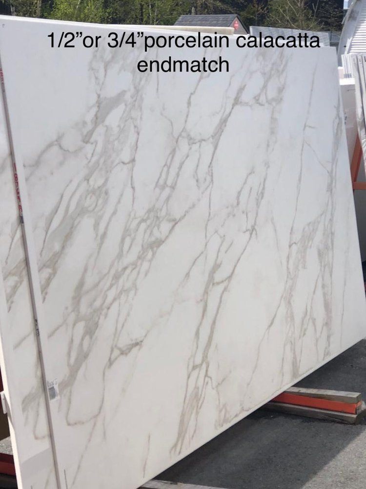 A large white slab of porcelain calacatta endmatch