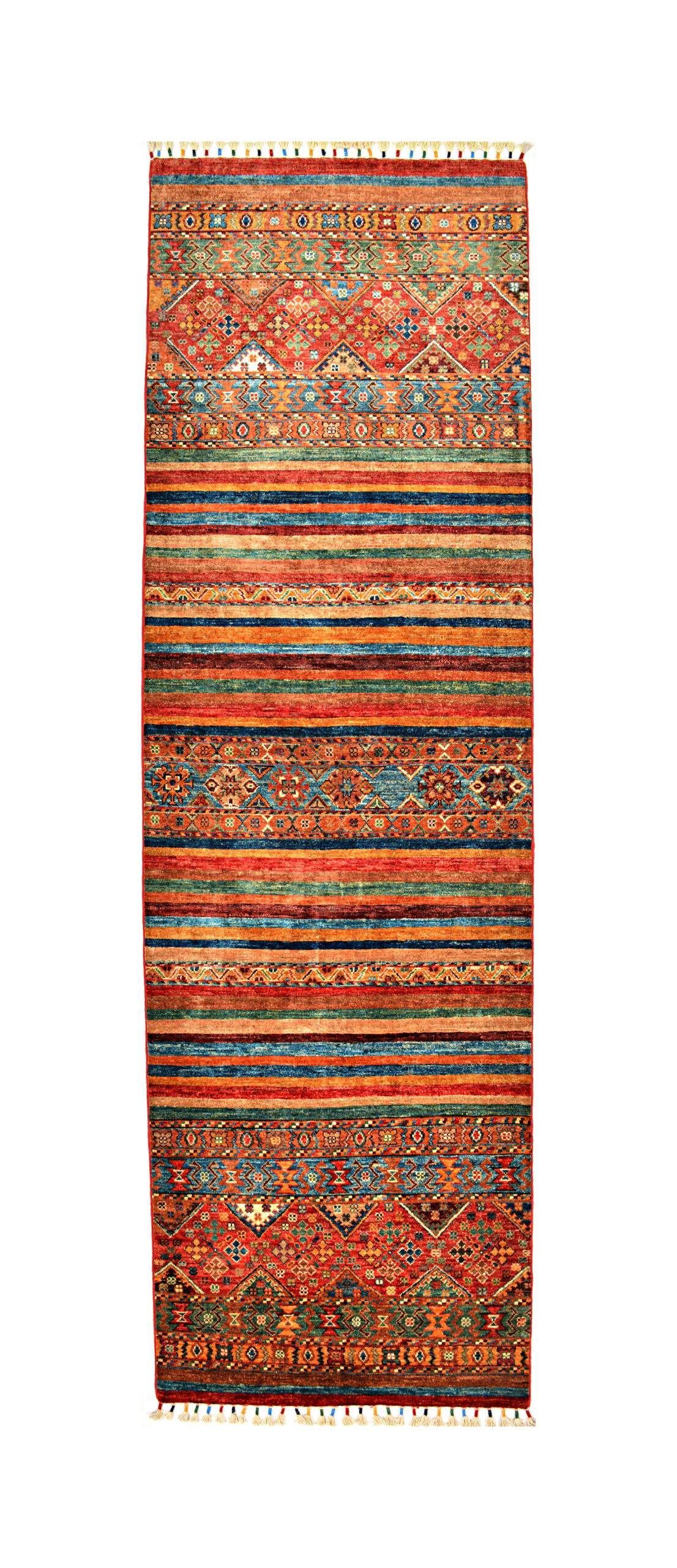 Tall multicolored woven rug with intricate red, orange, blue, and black geometric patterns