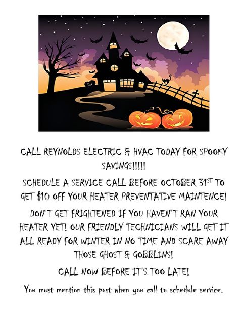 Halloween-themed ad: A haunted house, pumpkins, and bats. Call Reynolds Electric for heater maintenance.