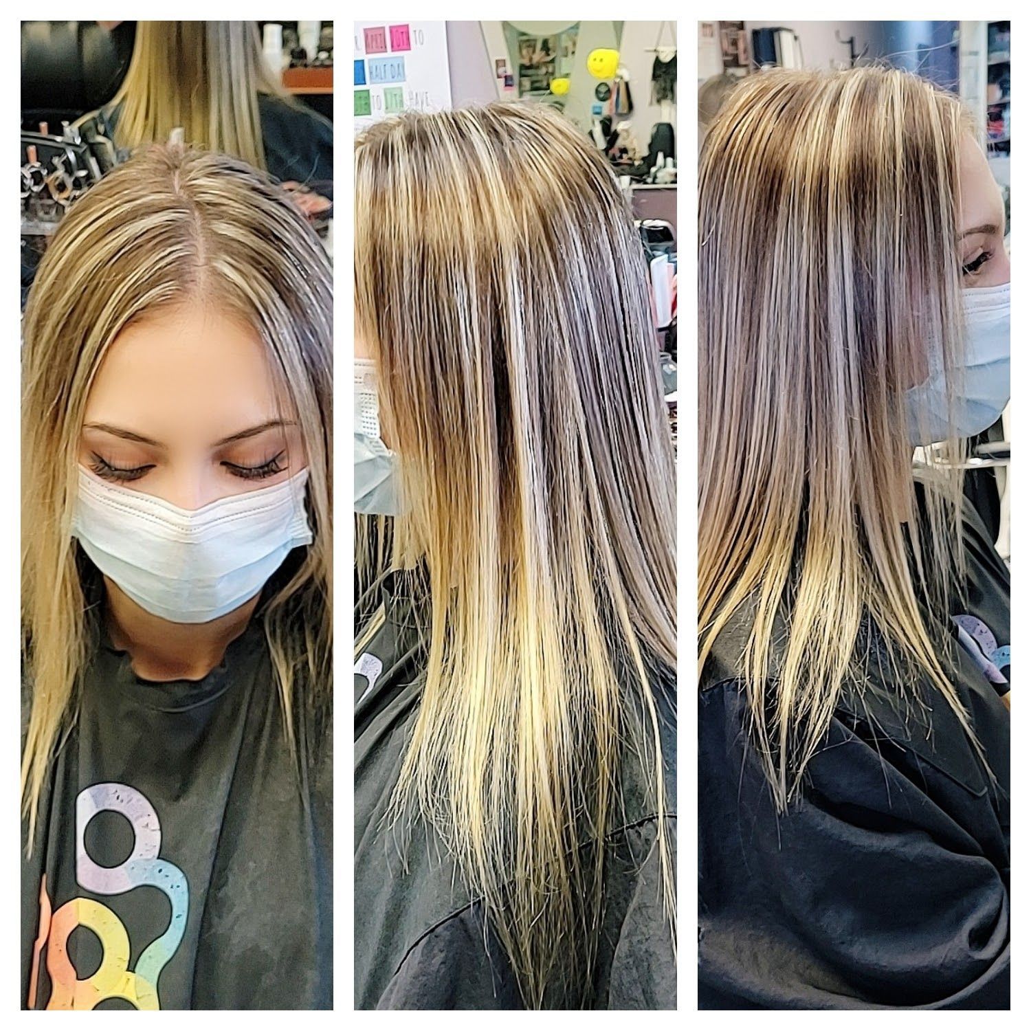a woman wearing a mask is getting her hair cut in a salon