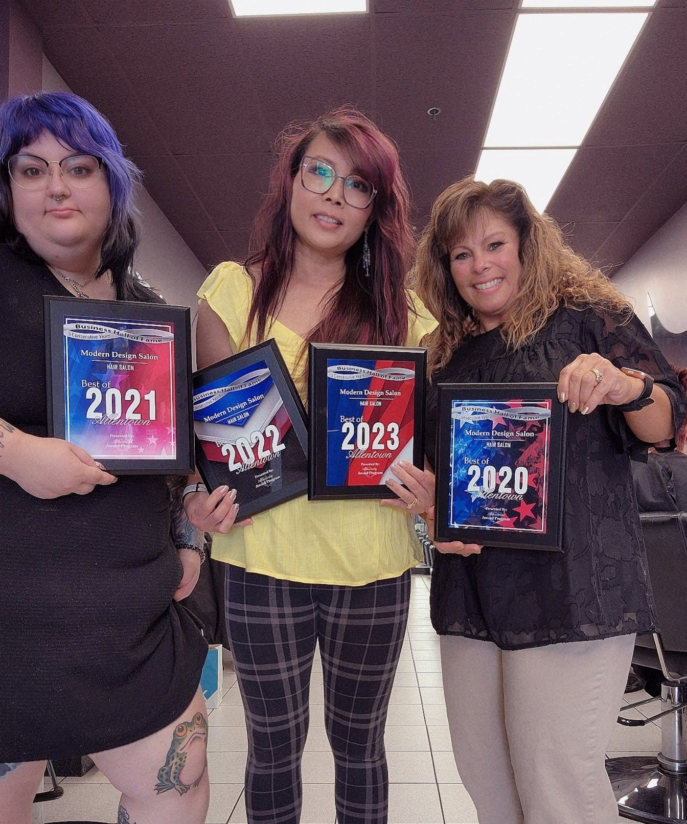 Women showing awards