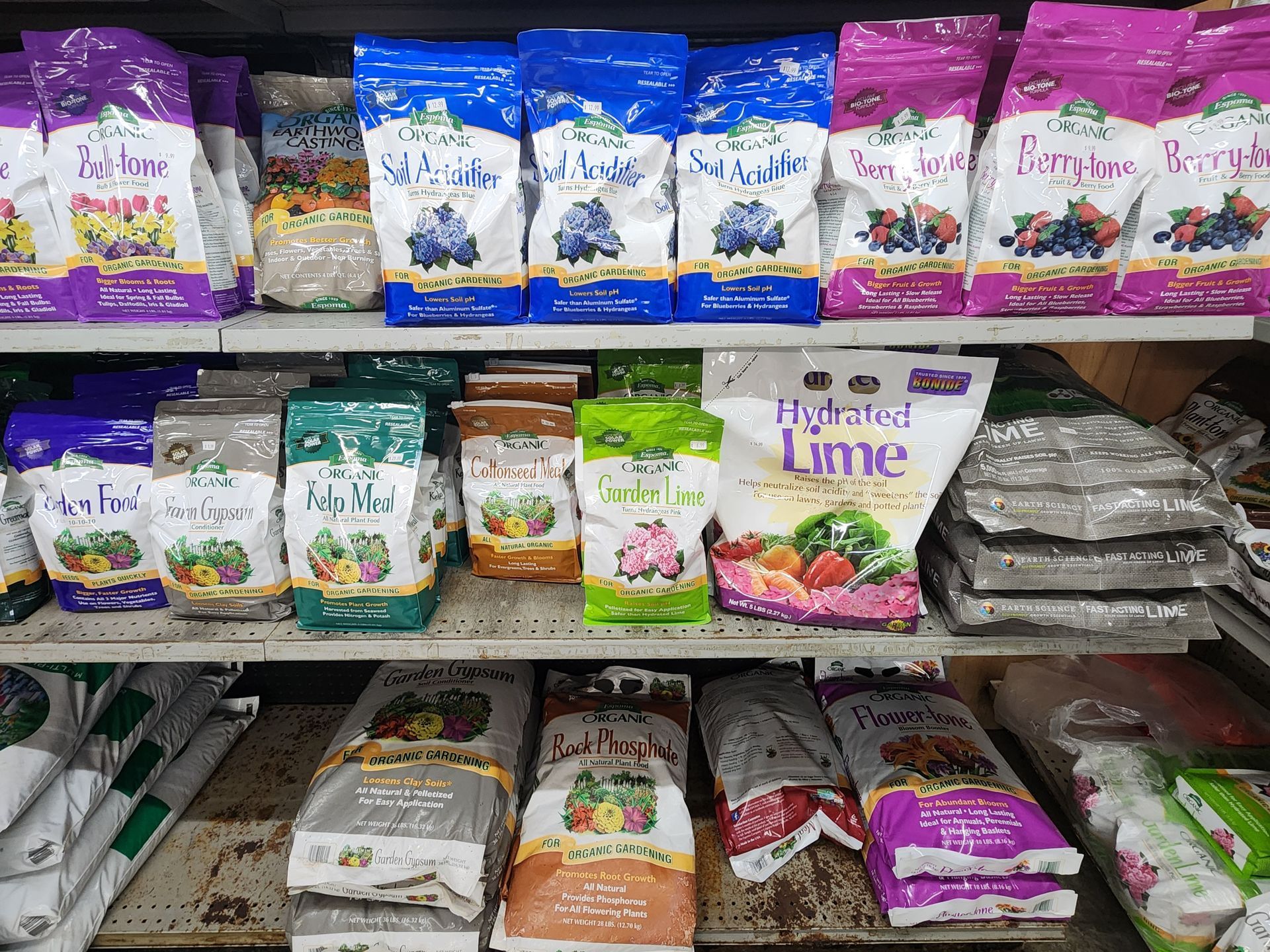 Shelves of colorful packaged organic snack and baking goods in a grocery store aisle