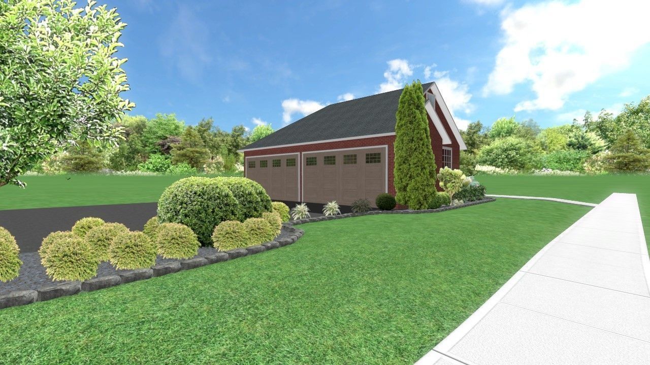 Garage with landscaping; green grass, bushes, and a driveway on a sunny day.