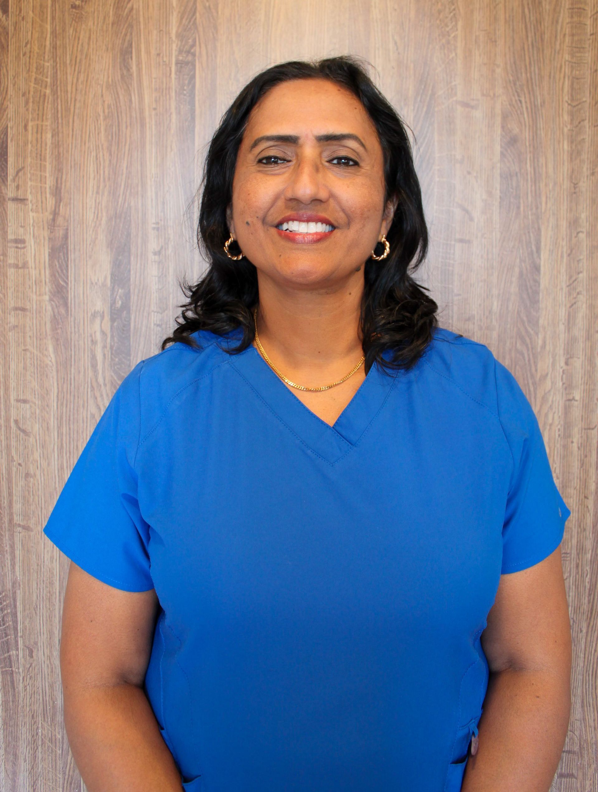 Photo of {{Team Member Name}}