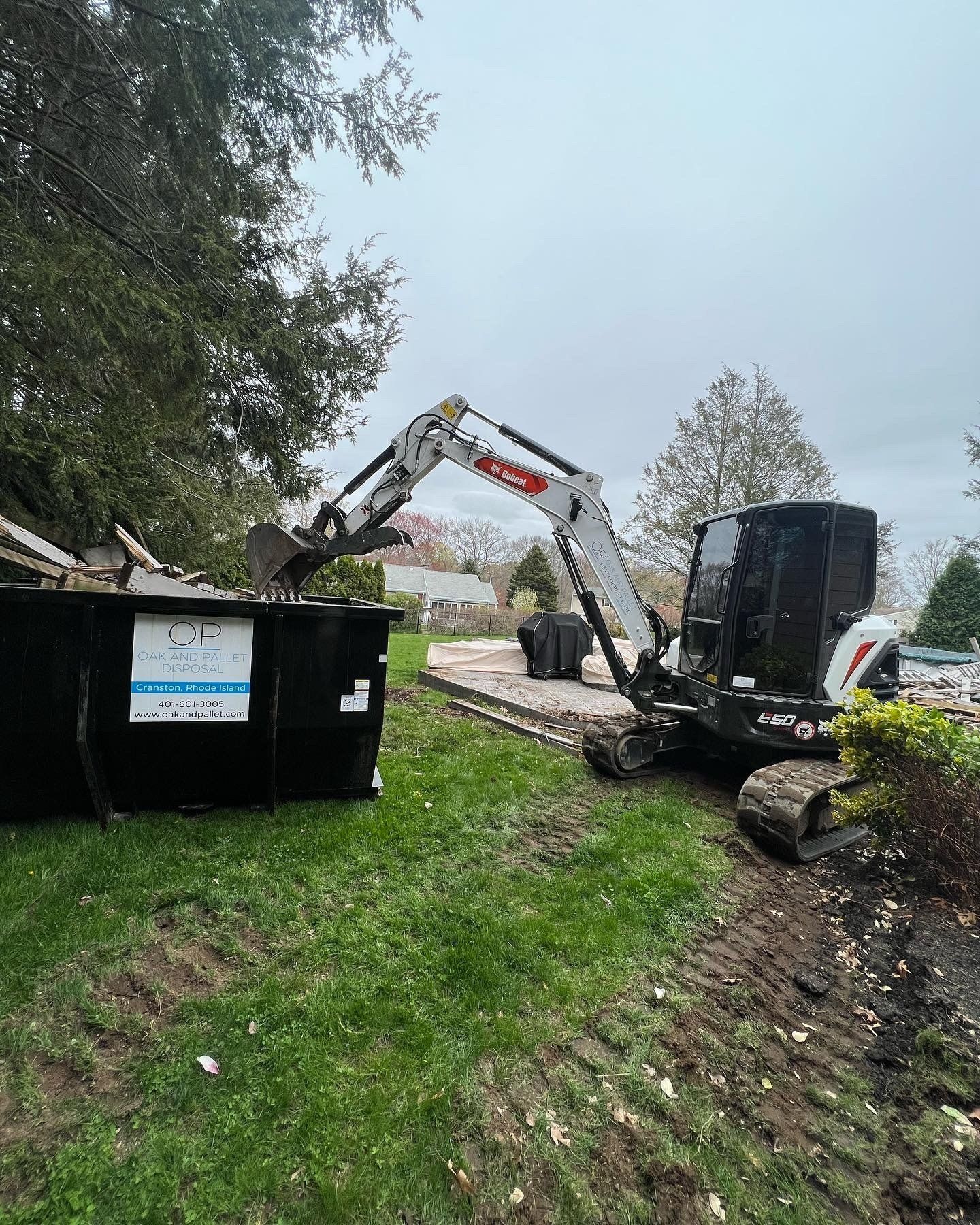 Debris removal using a excavator