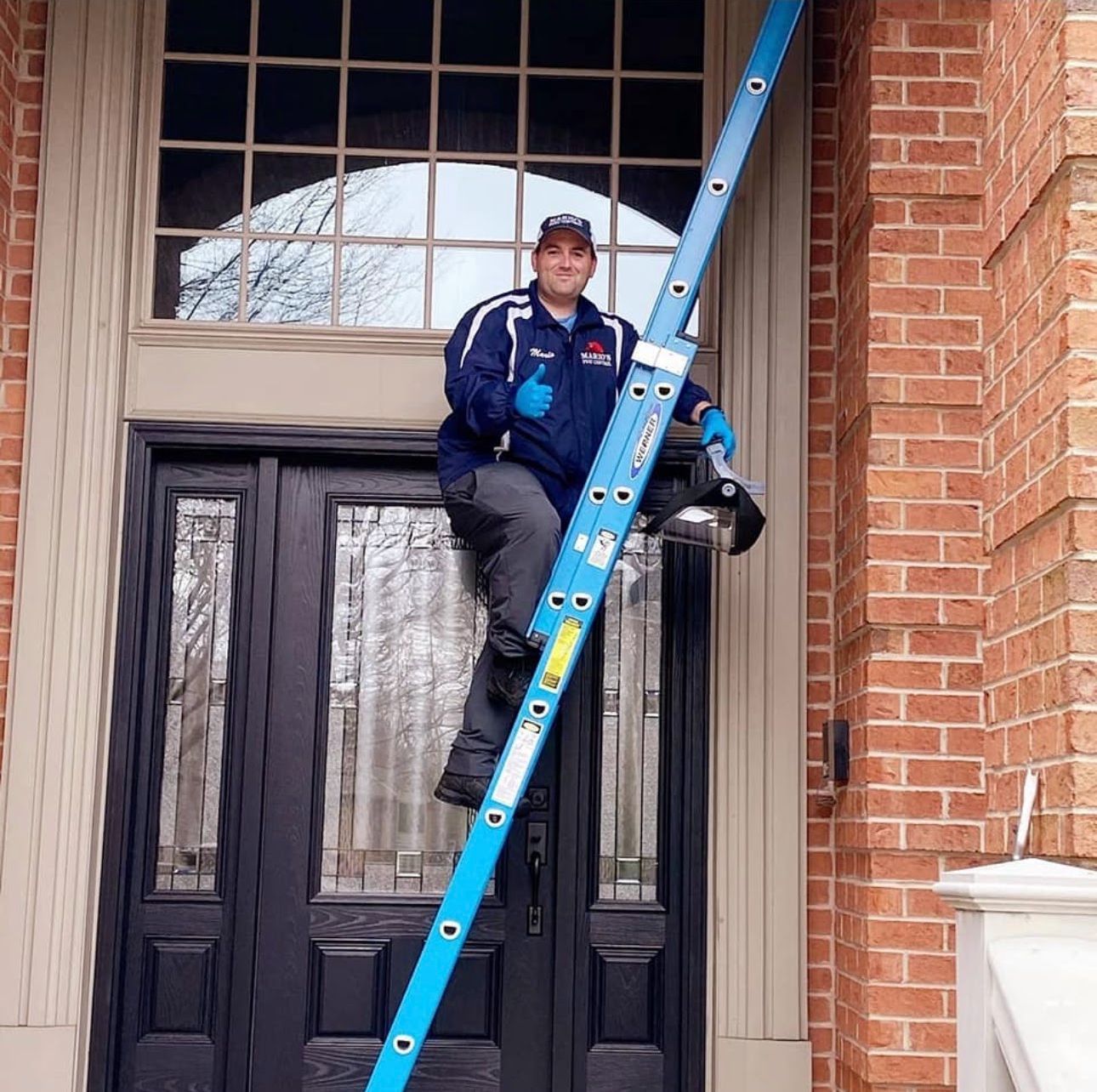 A man is setting up a bait for mice and rats