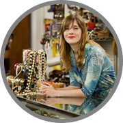 A woman in a pawn shop