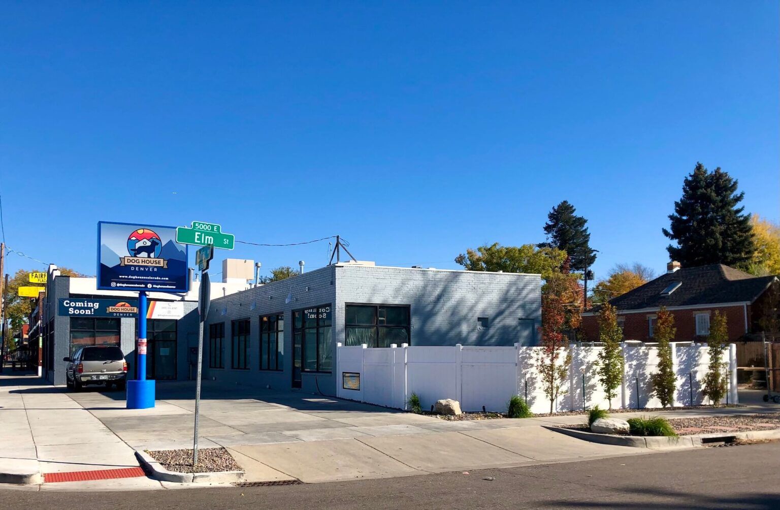 A car wash is located on the corner of a street