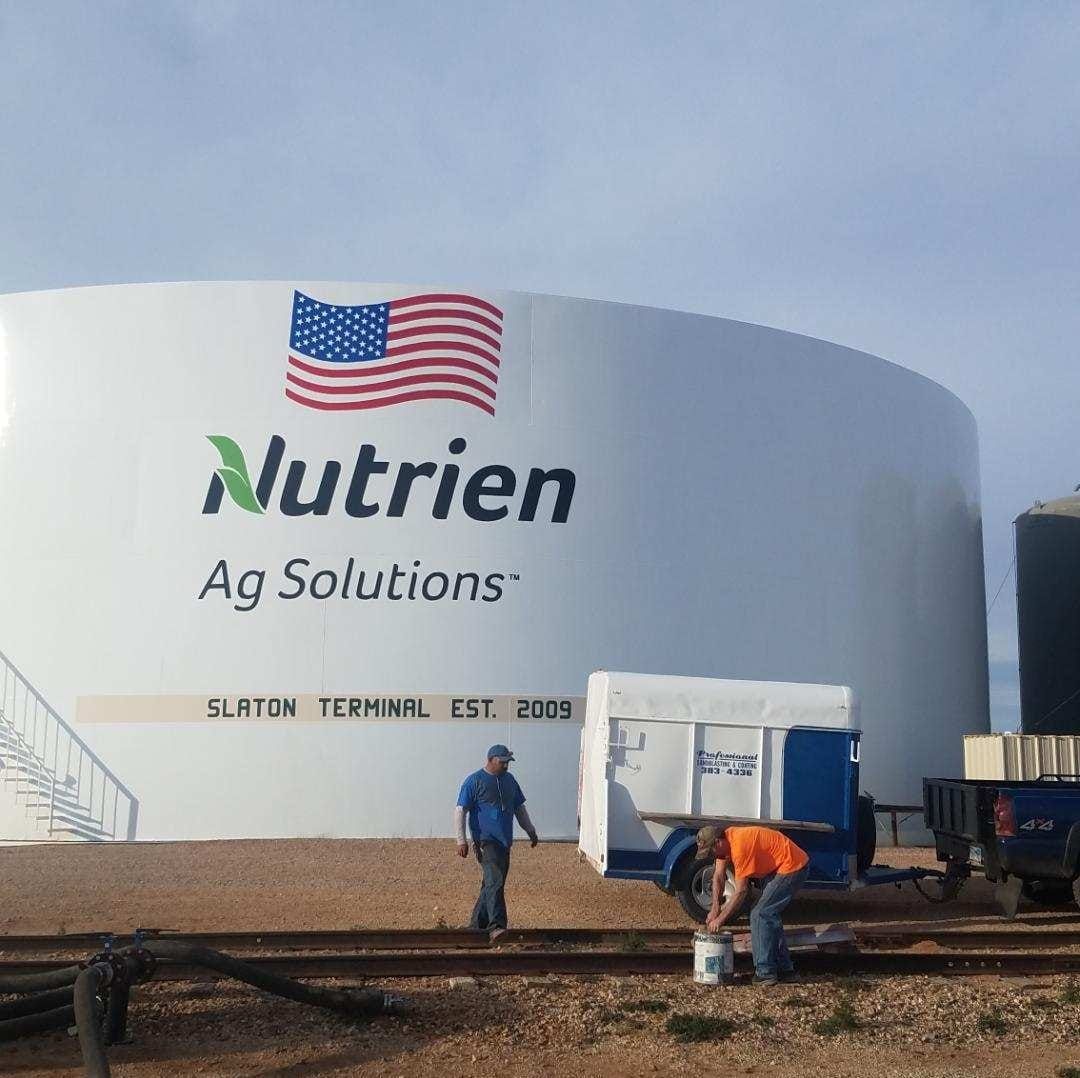 A large white tank that says nutrien ag solutions